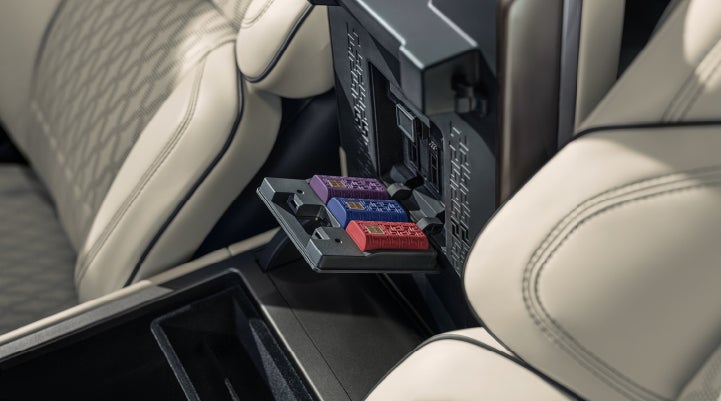 Digital Scent cartridges are shown in the diffuser located in the center arm rest. | Parks Lincoln of Gainesville in Gainesville FL